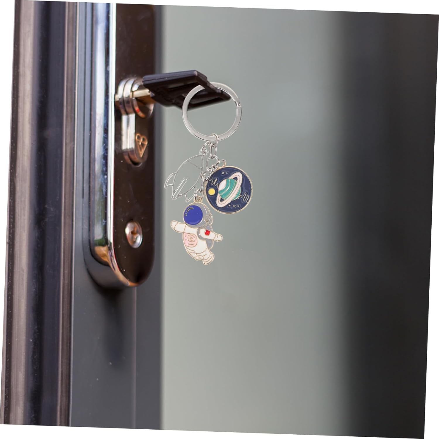 Cartoon Universe Keychain with Astronaut Design for Keys and Backpacks